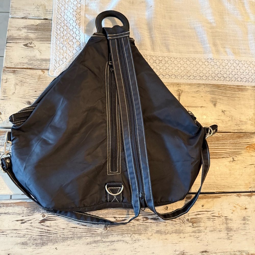 Avon Black Backpack with Teardrop Design and Vertical Zipper